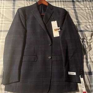 Calvin Klein sports jacket, never worn, tags on. Size 44L